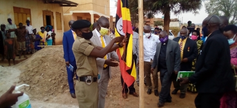 Hon Kyooma, Chair Happy and other leaders join in raising the flag to mark the beggining of Kanyarugiri Town Council